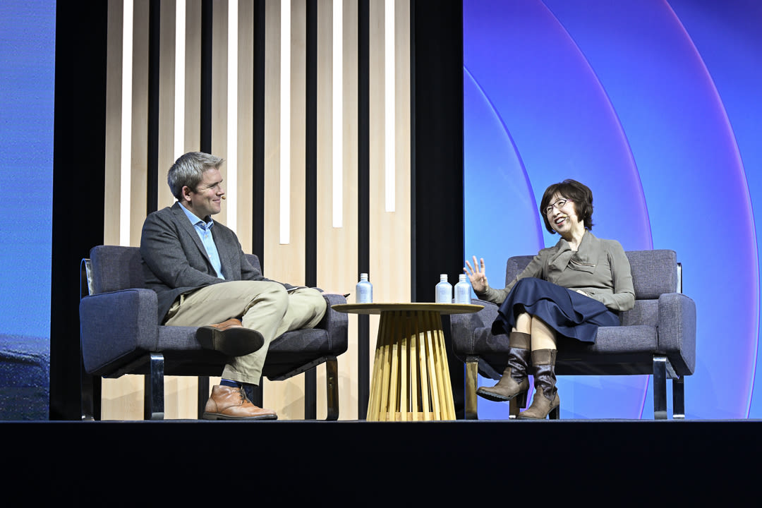 DeNA president and CEO Tomoko Namba on stage with Stripe cofounder John Collison.