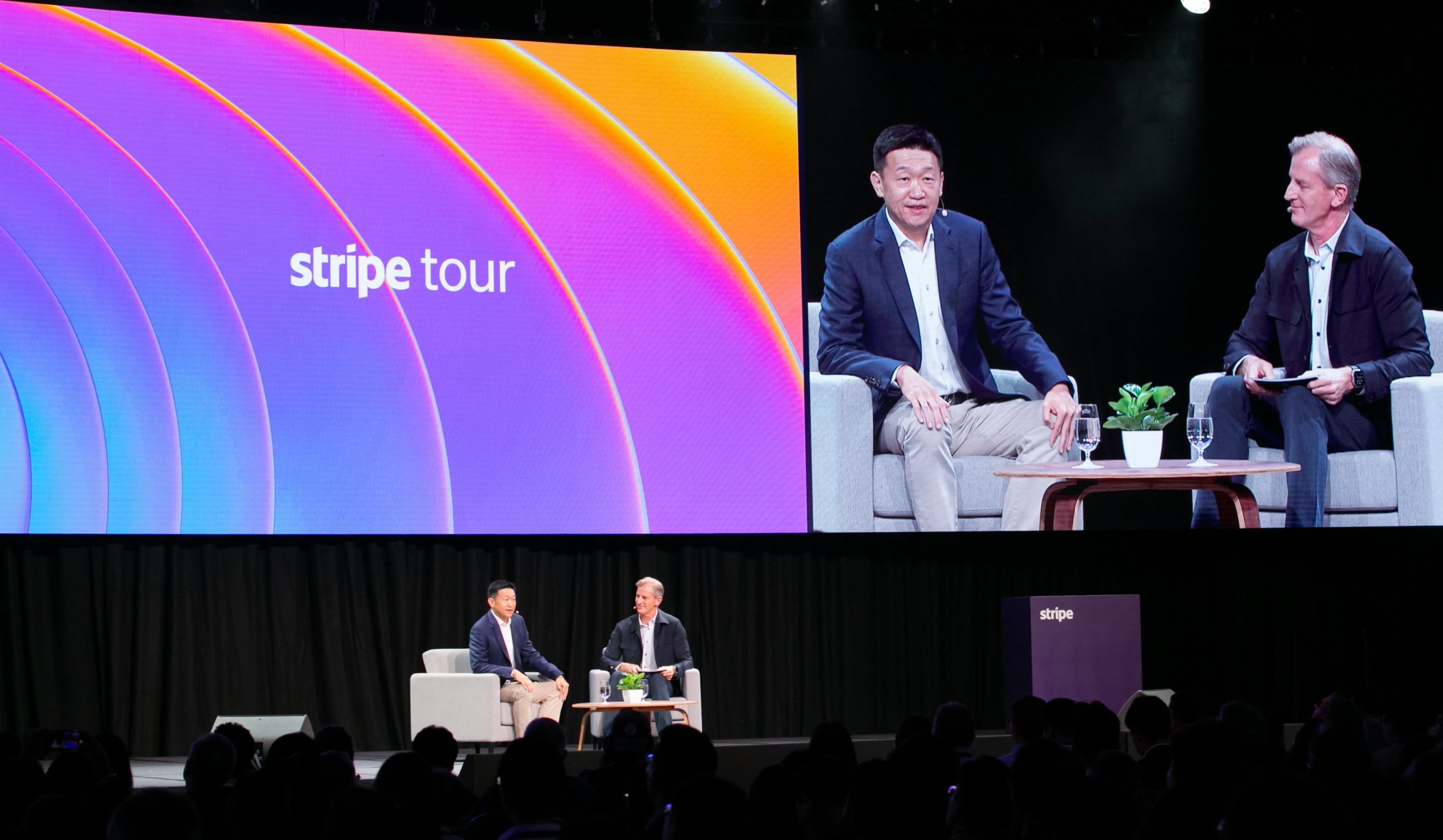 Newsroom > Tour Singapore 2026 > key visual Tyler - Sea founder and CEO Forrest Li on stage with Stripe CRO Tyler Bryson 
